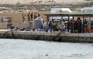 Migrantes en isla Lampedusa