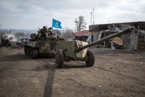 Pro-Russian rebels leave the eastern Ukrainian city of Debaltseve aft